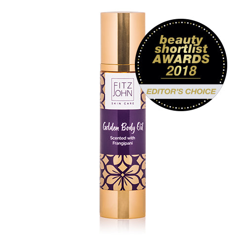 Fitzjohn Skin Care Golden Body Oil with Coconut and Moringa oil and the scent of Frangipani award winning.